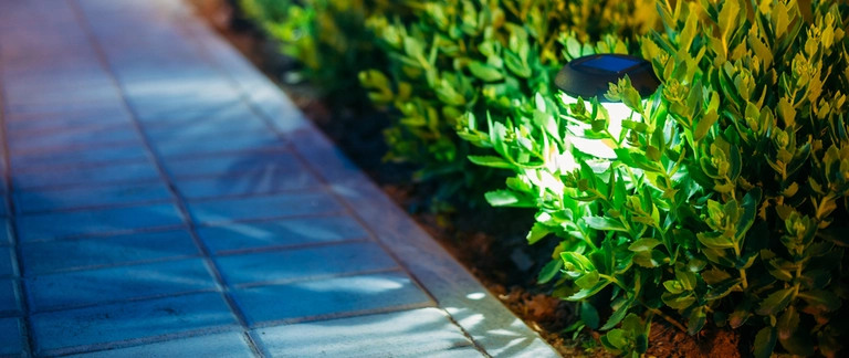 An LED outdoor light alongside a walkway leading to a home in Stewartsville, NJ.
